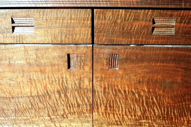 Close-up view of drawers & doors on Beveled Illusion Cabinet by Michael Elkan