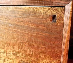 Close-up view of door on Beveled Illusion Cabinet by Michael Elkan