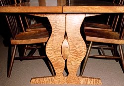 Below table view of Quilted Lady Table with Walnut & Maple chairs by Michael Elkan